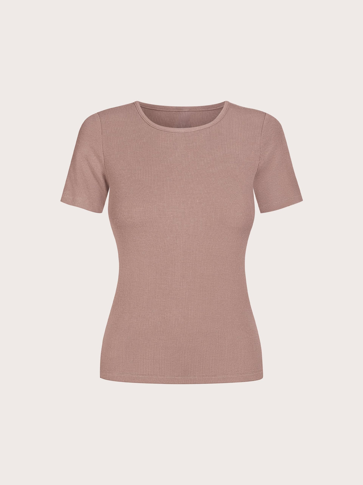 A short-sleeve crewneck ribbed knit top in a dusty rose color, displayed on a clean, solid, light beige background.