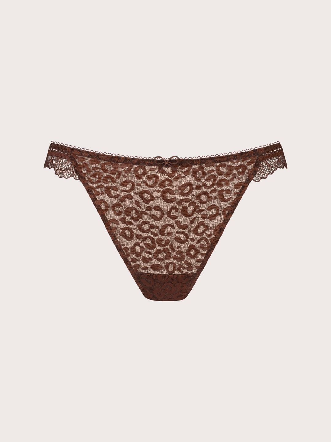 Brown leopard print lace thong underwear with a lace waistband and bow detail, shown flat against a light beige background.
