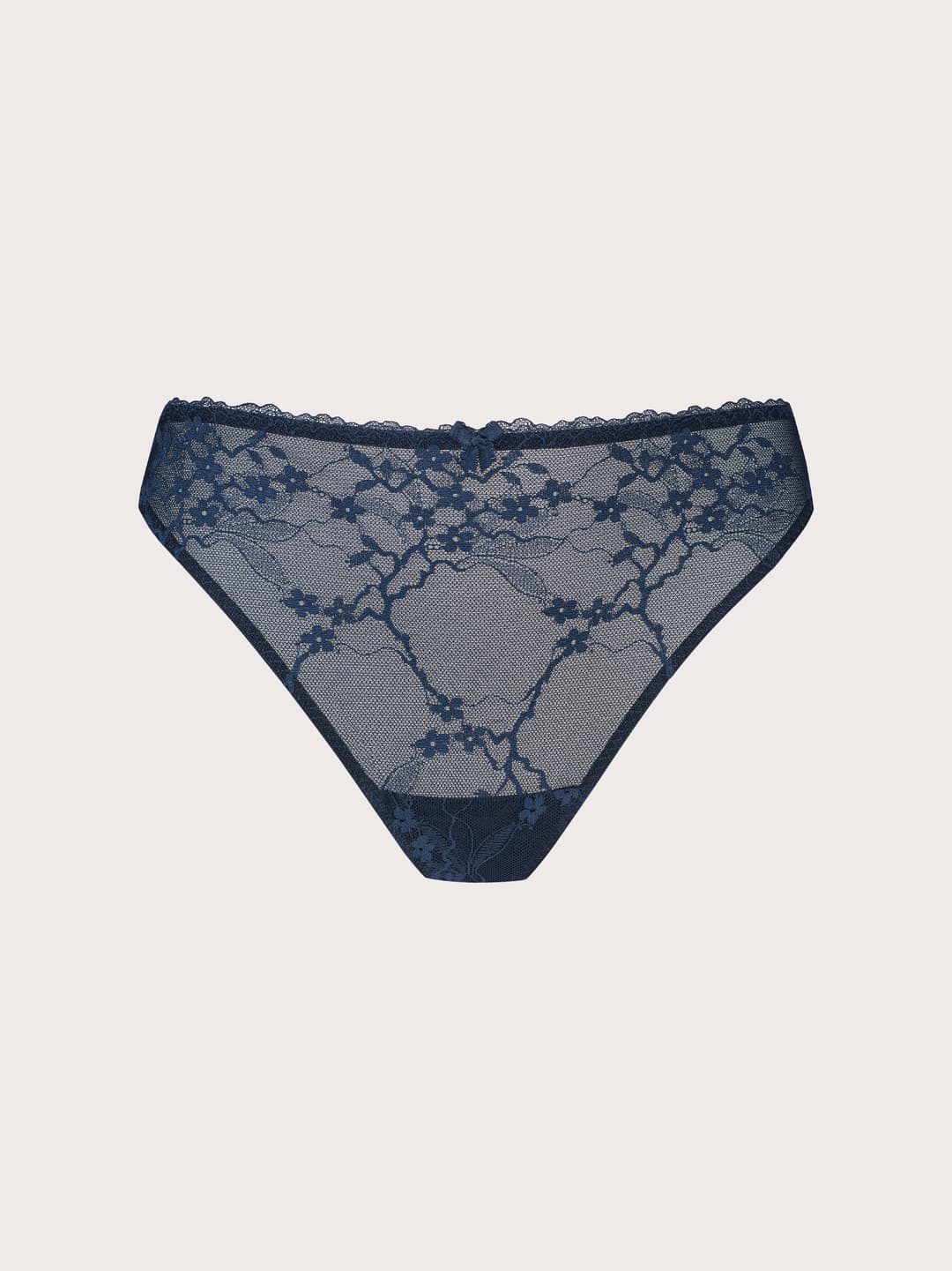 A pair of navy blue lace panties with a sheer mesh body and floral lace pattern, displayed flat against a light beige background.